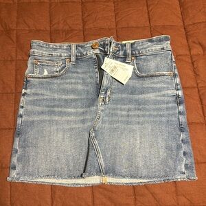 Blue denim mini skirt